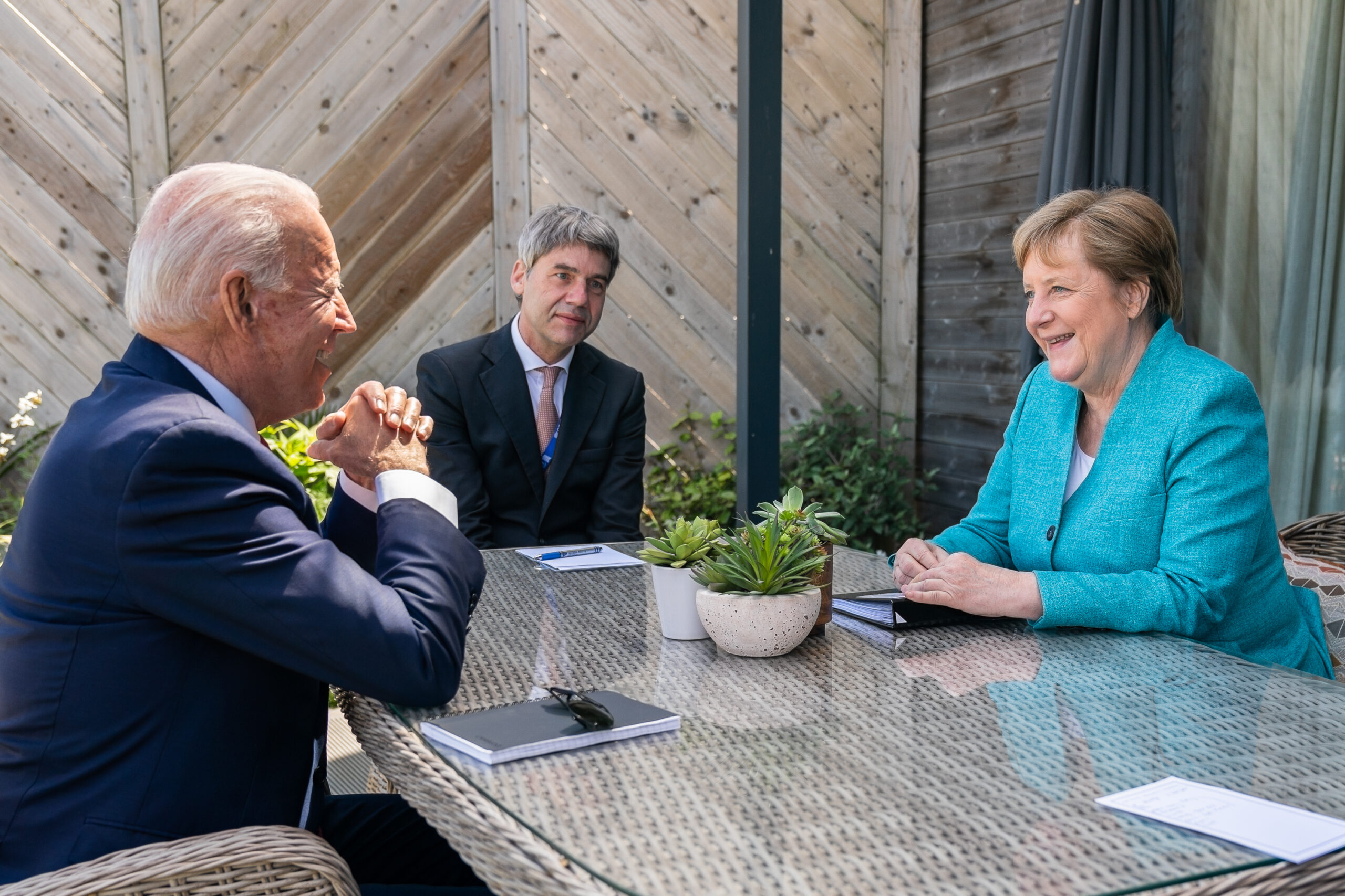 President Joe Biden meets for a brief pull-aside meeting with German Chancellor Angela Markel during the G7 Summit at the Carbis Bay Hotel